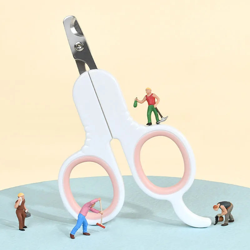 Grey pet nail clippers with curved tips and a rubber-coated ergonomic handle for cats and small dogs.