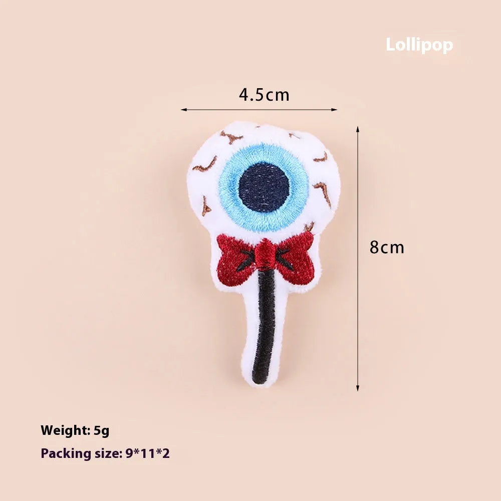 Small plush cat teaser wand toy with dangling elements in candy colour design