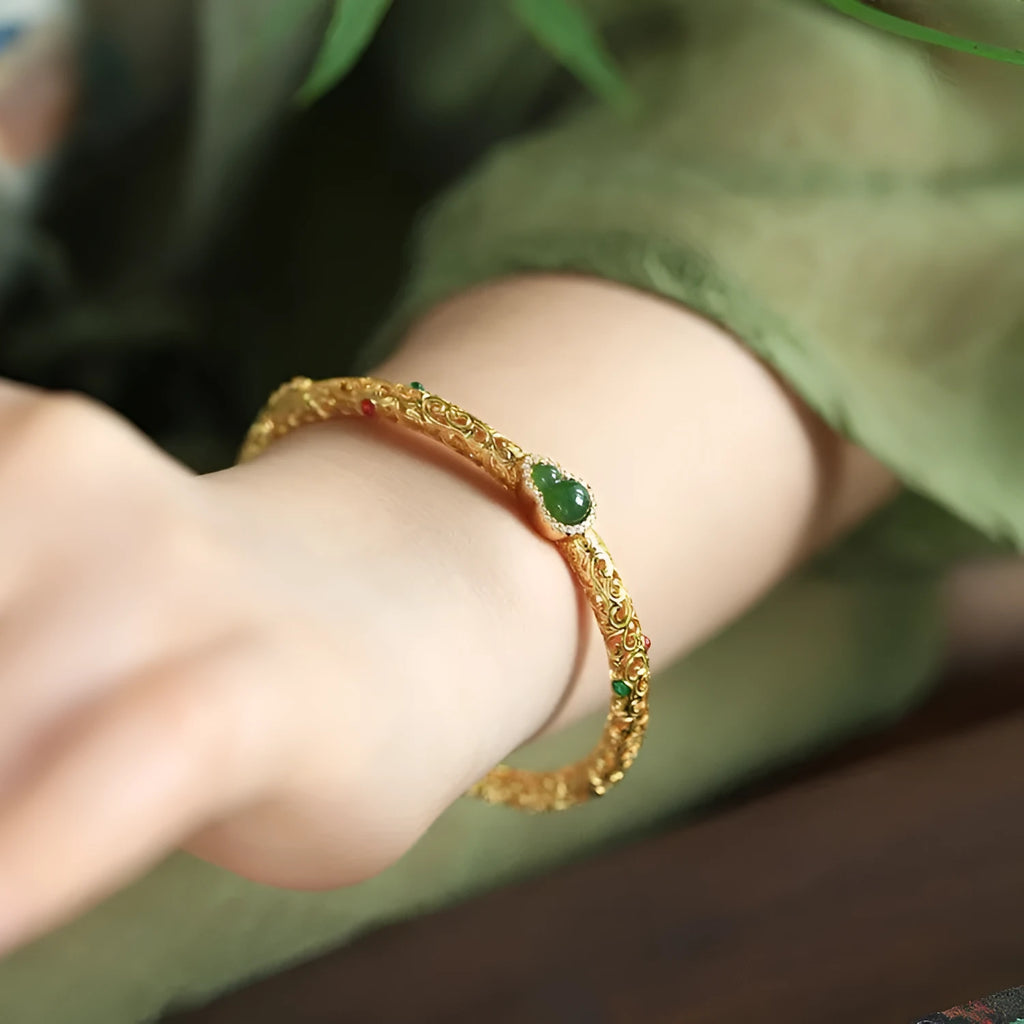 Gold-plated copper women's bracelet with retro opening xiangyun gourd charm in open style design