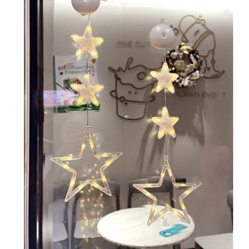 Christmas LED window decorations with suction cups showing star, tree, and deer pendant designs