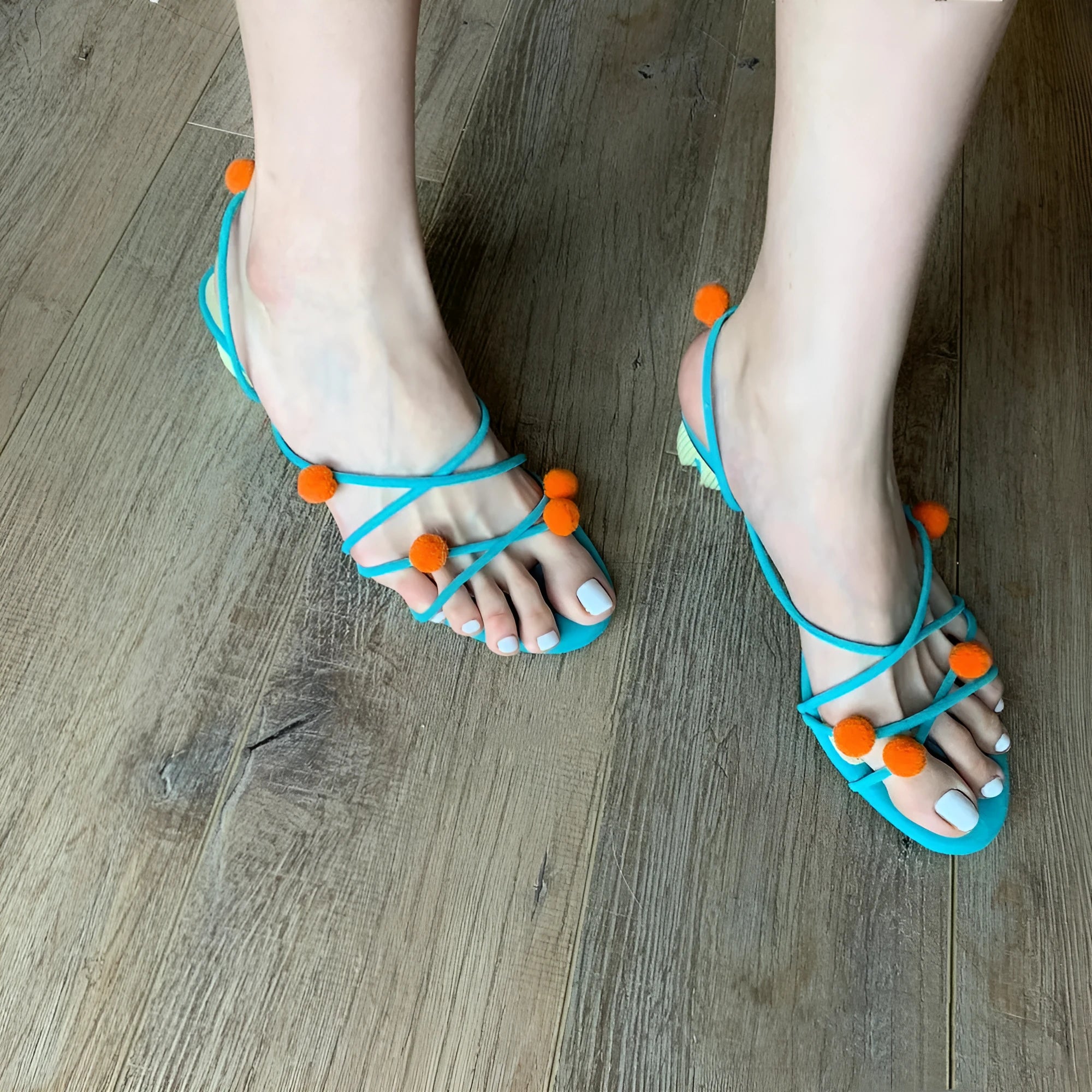 Cyan women's leather high-heel sandals with lace-up straps and ball decoration