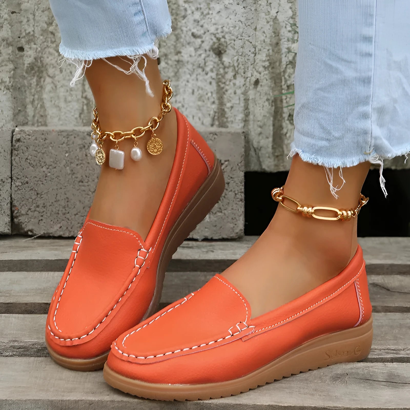 Women's flat loafer shoe in PU leather with a round toe and rubber sole, shown in a colour option.