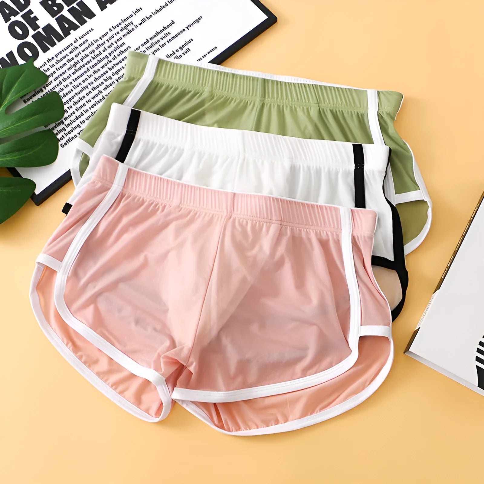 Men's ice silk mesh boxers in low-waist design showing ultra-thin fabric texture