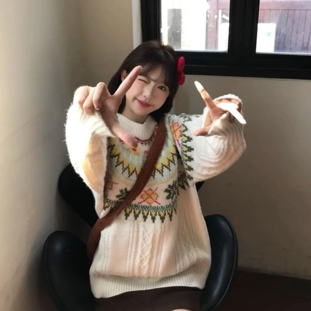 Milky white women's pullover sweater with lantern sleeves and a loose fit.
