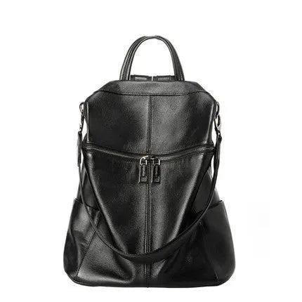 Women's genuine leather retro backpack showing internal organisation compartments and sewing thread detailing