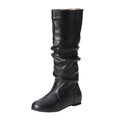 Women's black slip-on flat ankle boots with a round toe and high cylinder shaft.