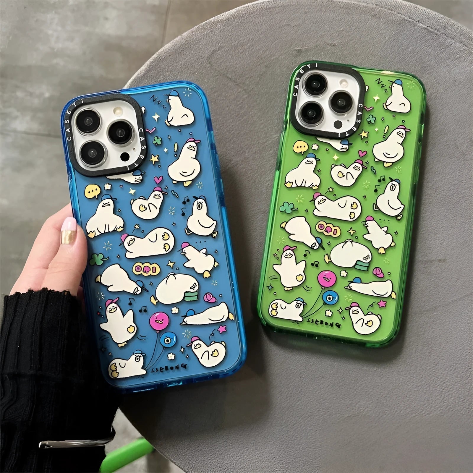 Little Duck creative phone case in green flash acrylic finish, drop-resistant PC hard case for Apple iPhone, cartoon duck design