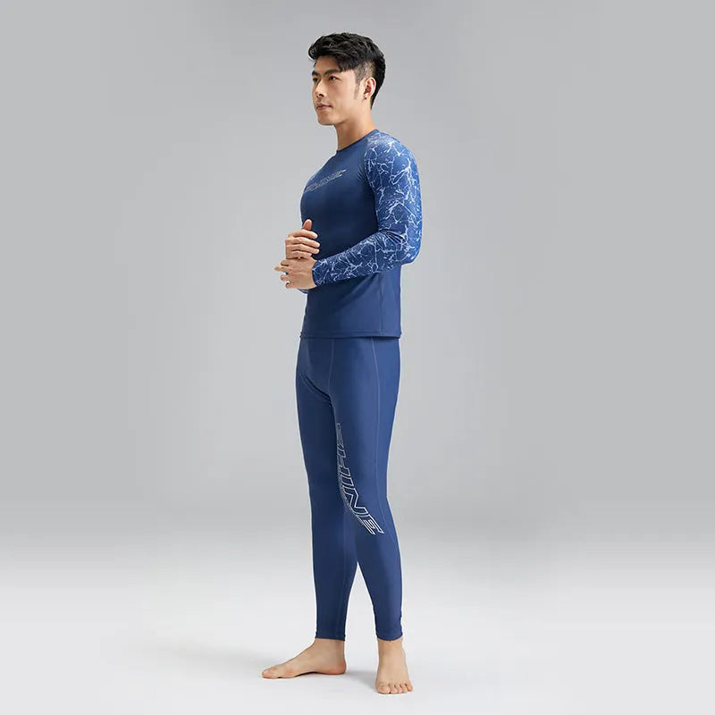 Dark blue men's two-piece swimwear set with a top and trousers on a mannequin.