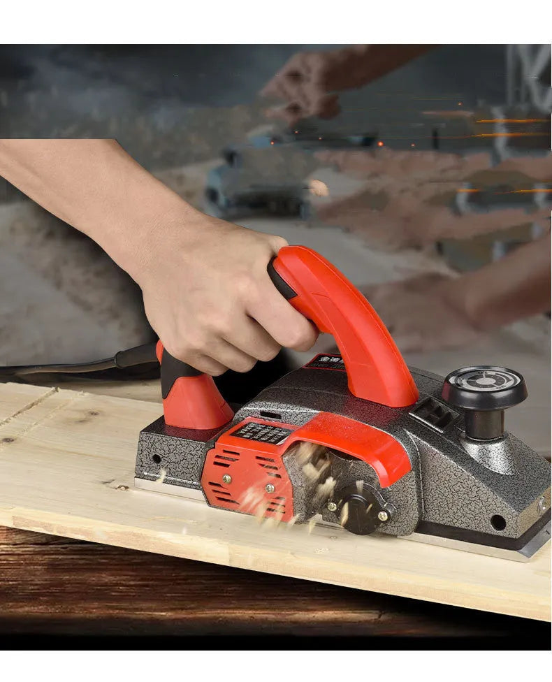 Red aluminium shell electric wood planer tool with 82mm planing width for carpentry work