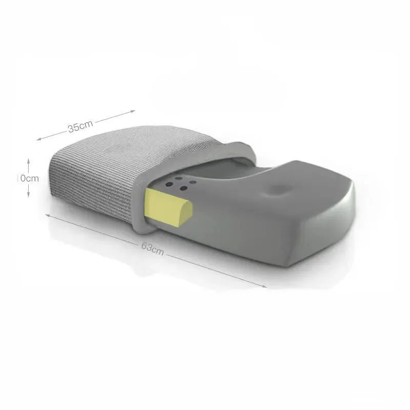 Grey memory foam massage pillow with knitted cotton cover on a bed, offering adjustable neck support for sleep