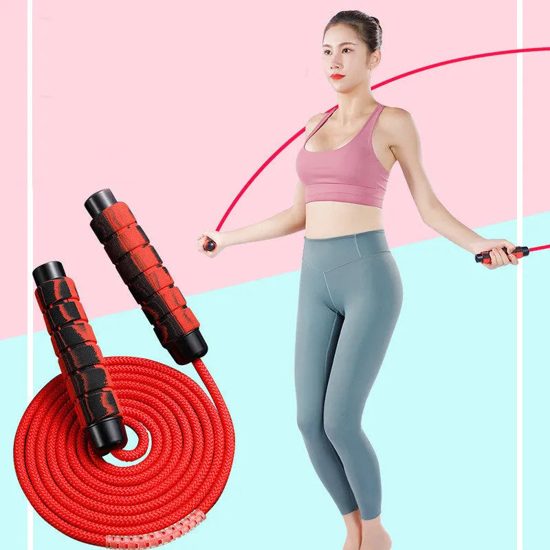 Red and grey polyester skipping rope, 2.8 metres long, with 16cm handles and 4cm diameter