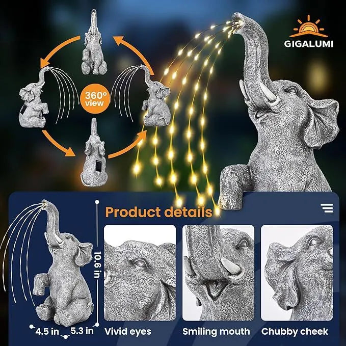Resin elephant garden statue with built-in LED light strip on grass.