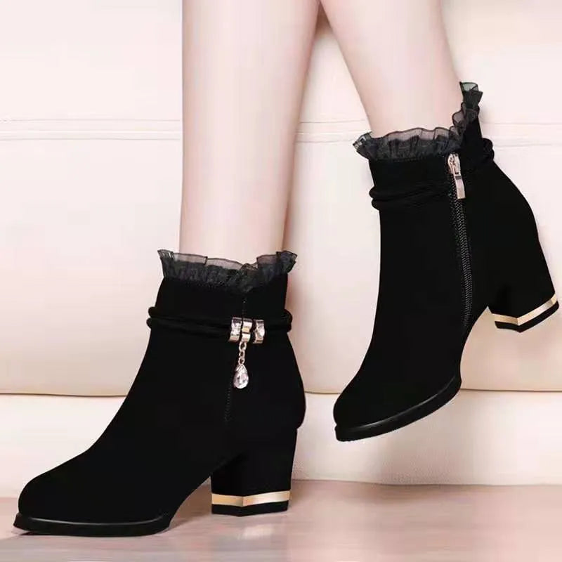 Black Season Tide sandal boots with mid-heel, tassel detail, and round toe for women
