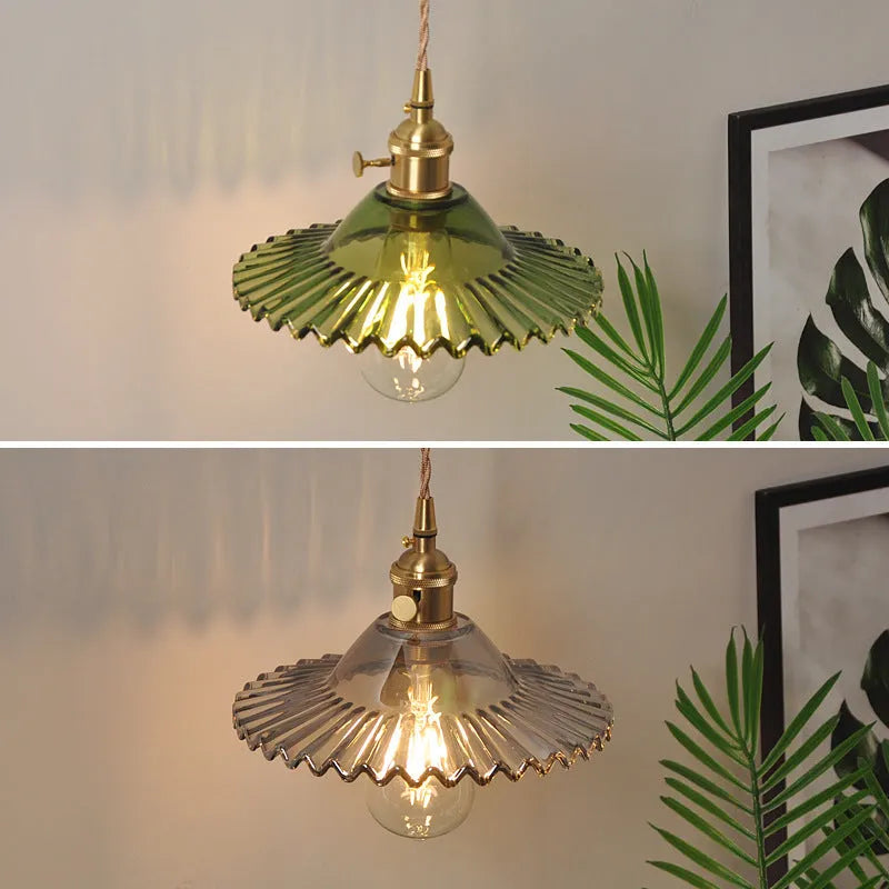 Retro brass lotus wall lamp with copper base and glass shade in one of six colours.