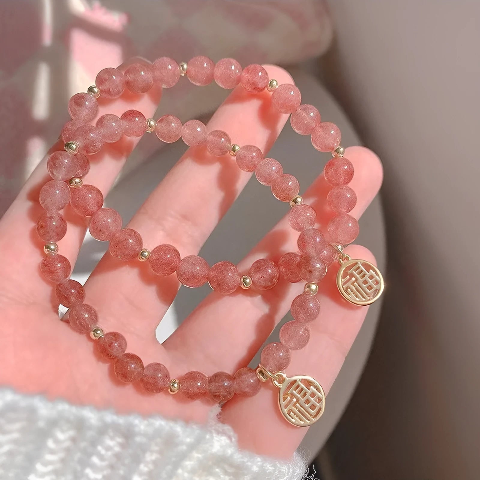 Women's strawberry quartz blessing card bracelet with glass construction and universal wrist size