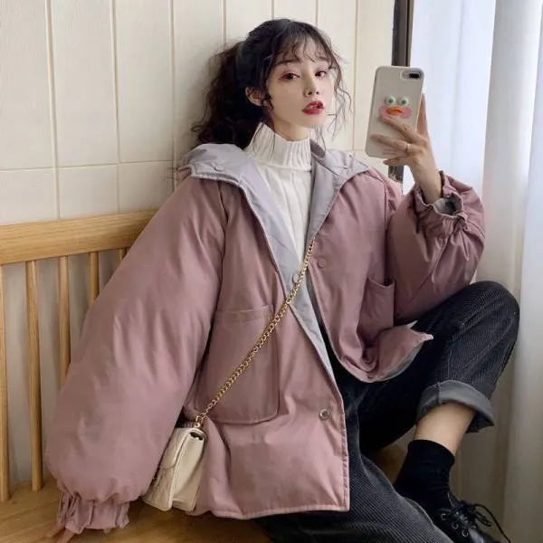 Korean reversible coat made of polyester in apricot colour with pockets and straight cut