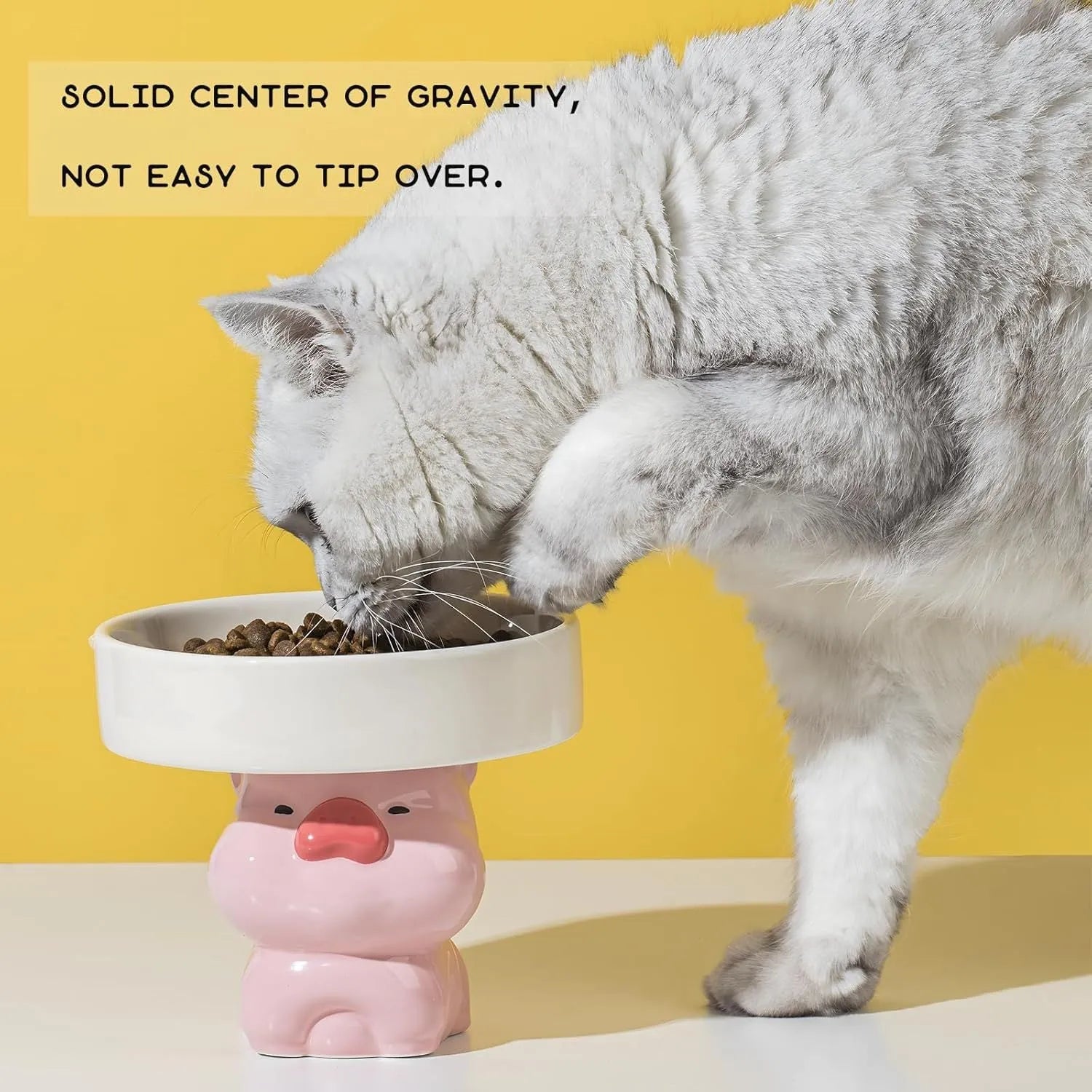 Raised ceramic cat bowl with animal design on 12.5cm elevated base