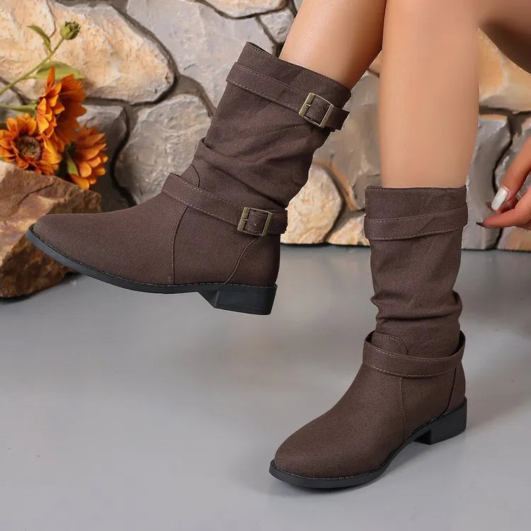 Square heel round toe women's boots in brown artificial PU with leather stitching and rubber sole