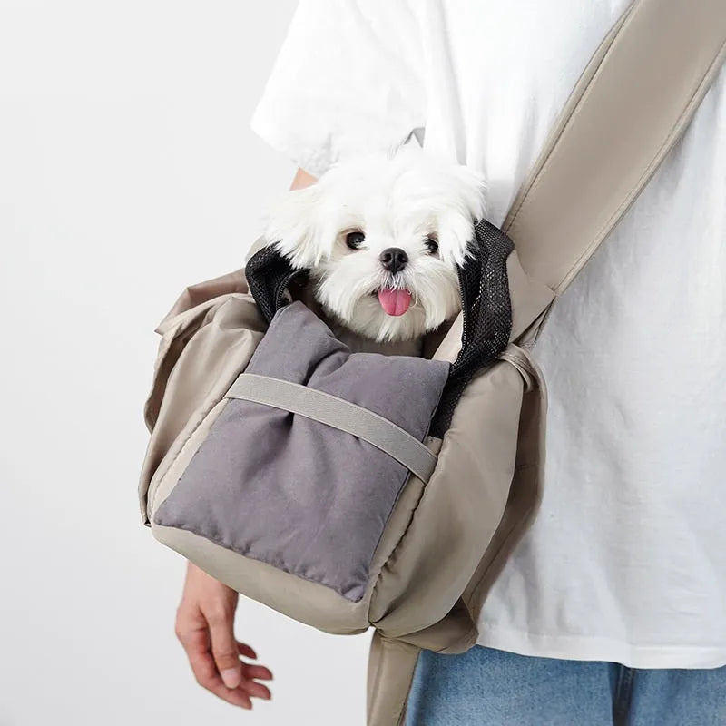 Apricot cloth pet carrier handbag for small dogs or cats, showing handle and breathable fabric.