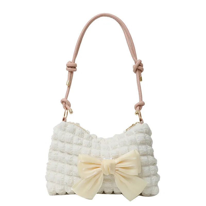 Women's canvas single-shoulder handbag in street-trend style with sandwich pocket design