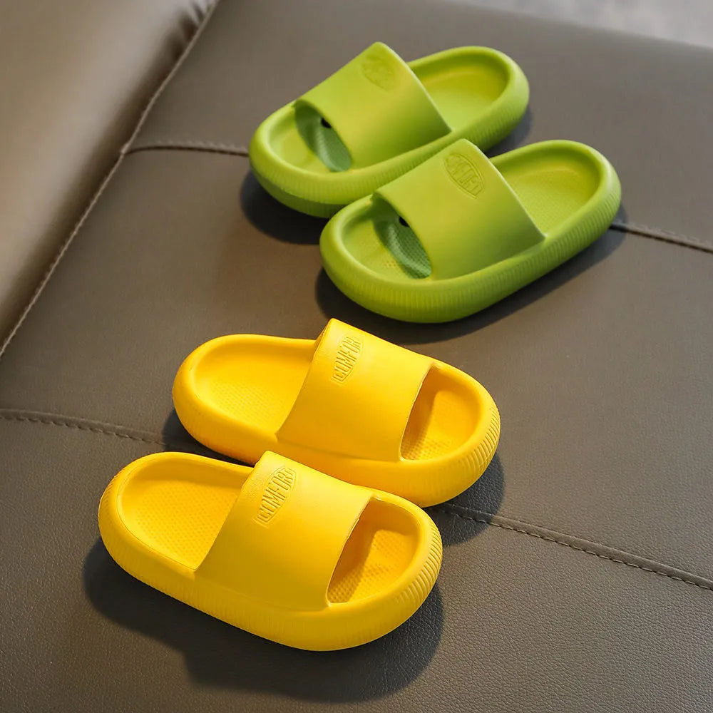 Children's colourful EVA slippers with a non-slip sole on a white background.