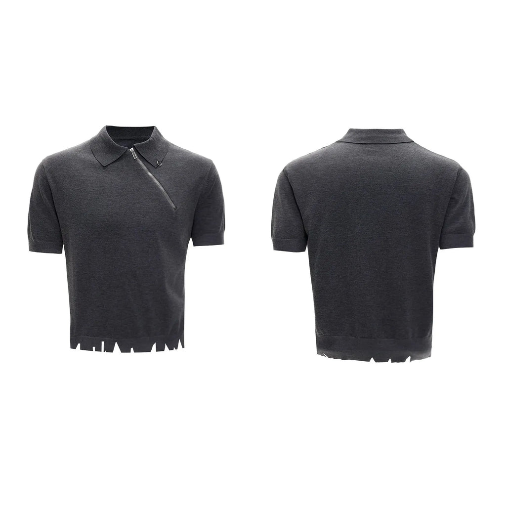 Man wearing a slim-fit black knitted polo shirt with an oblique diagonal zipper and lapel collar.