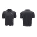 Man wearing a slim-fit black knitted polo shirt with an oblique diagonal zipper and lapel collar.