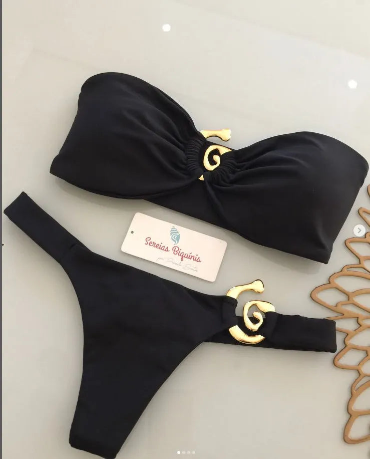 Women's metal ornament split swimsuit in black with snail ornament and removable shoulder straps
