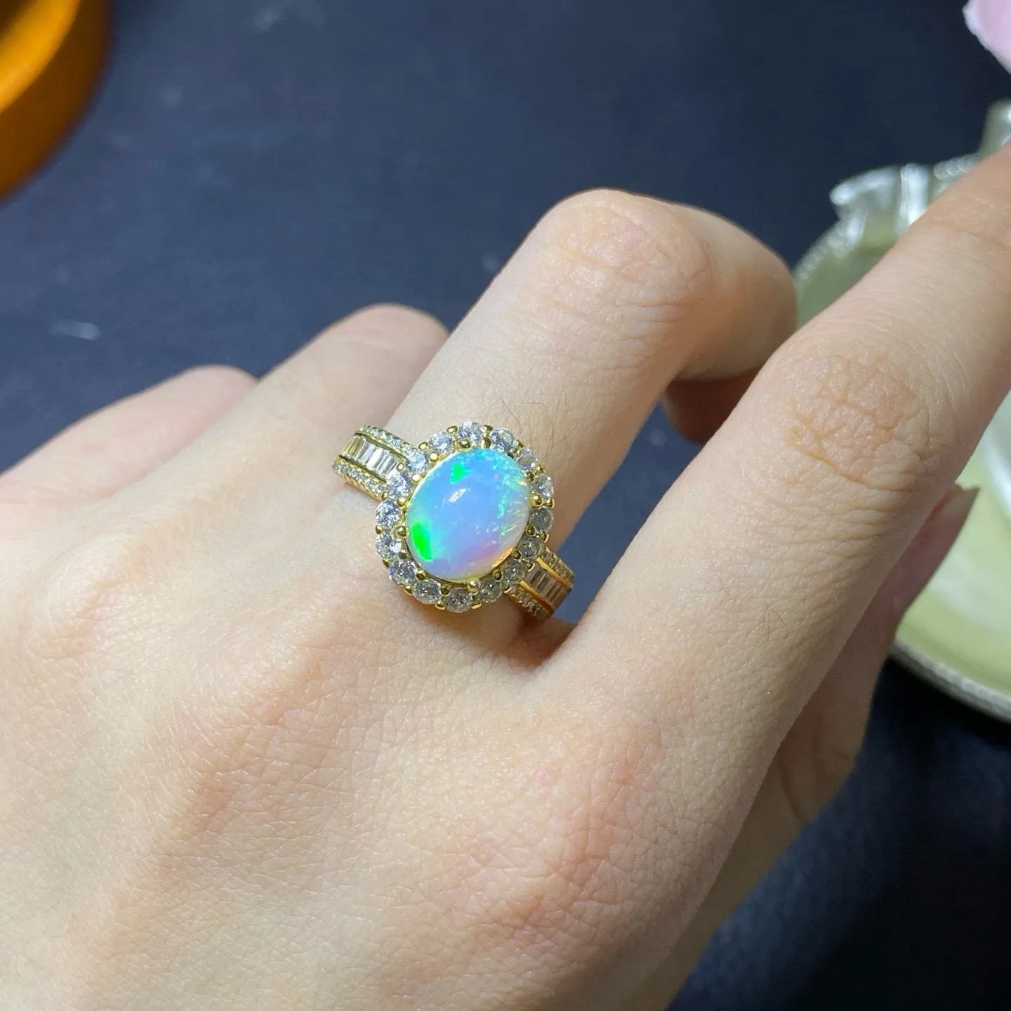 Handmade sterling silver adjustable opal ring showing rose gold, white gold, and yellow gold plated finish options.