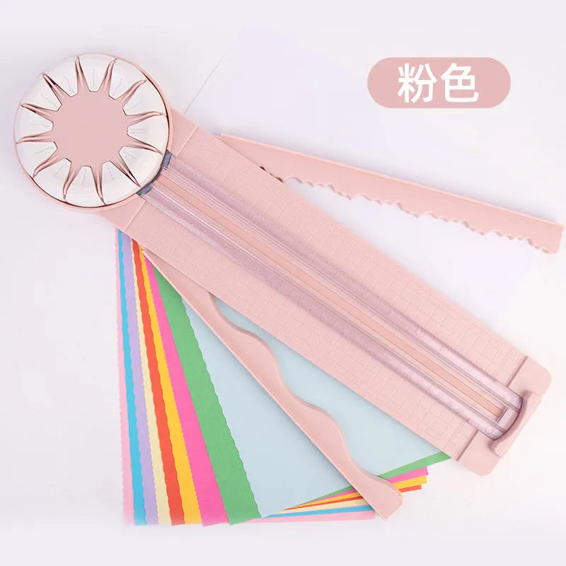 Pink and black multifunctional 12-in-1 dotted plastic paper cutter machine for crafts.