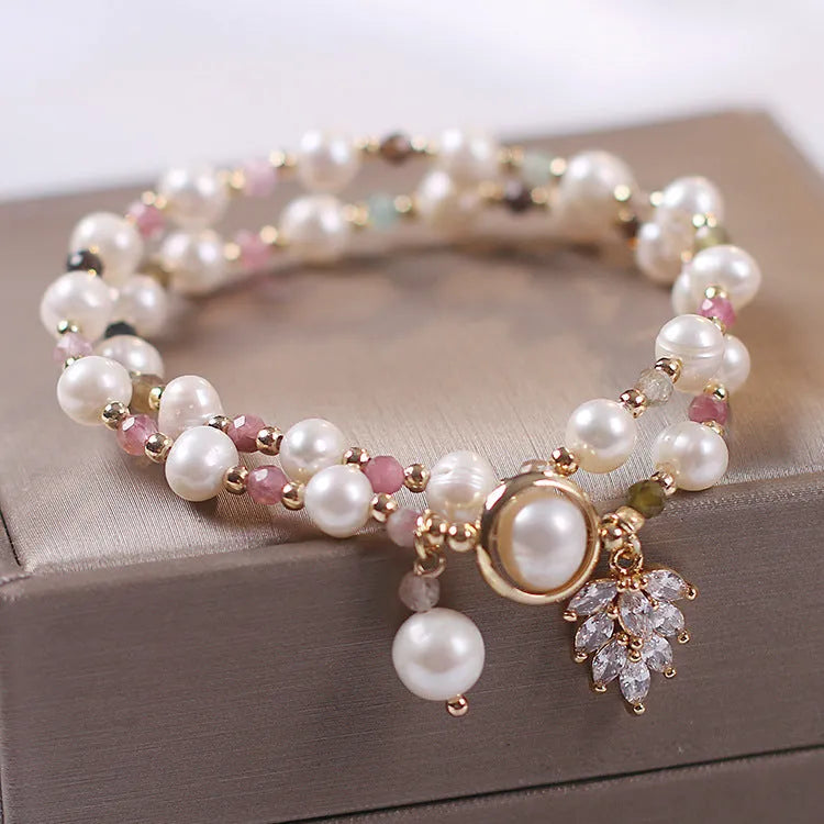 Double layer strawberry quartz bracelet with lucky cat charm in red cat's eye flowers colour