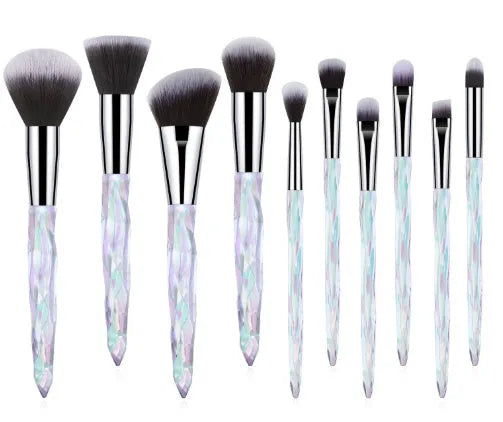 10 clear crystal handle foundation brushes with diamond shank design and black bristles.