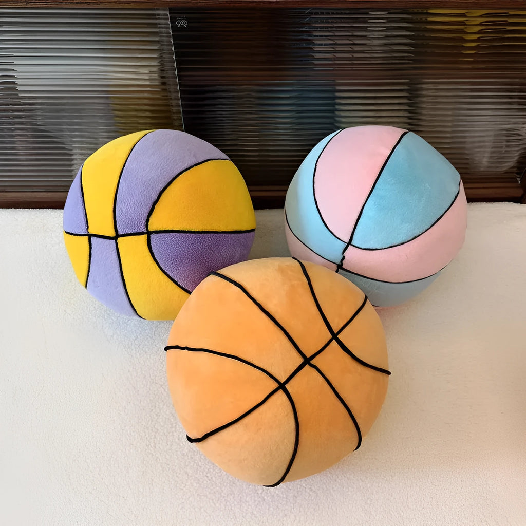Soft spherical basketball plush toy in orange with black lines, 28cm tall, on a light background