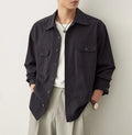Men's simple lapel casual shirt in light sand rice colour, showing long sleeves and front button placket.