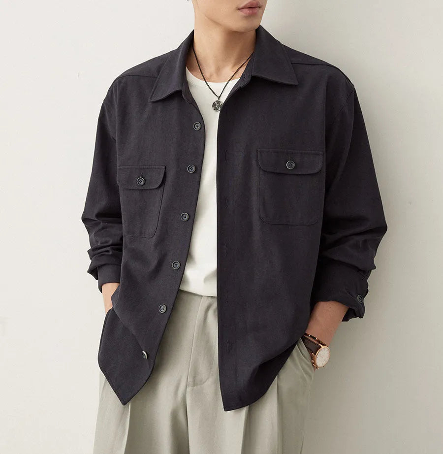 Men's simple lapel casual shirt in light sand rice colour, showing long sleeves and front button placket.