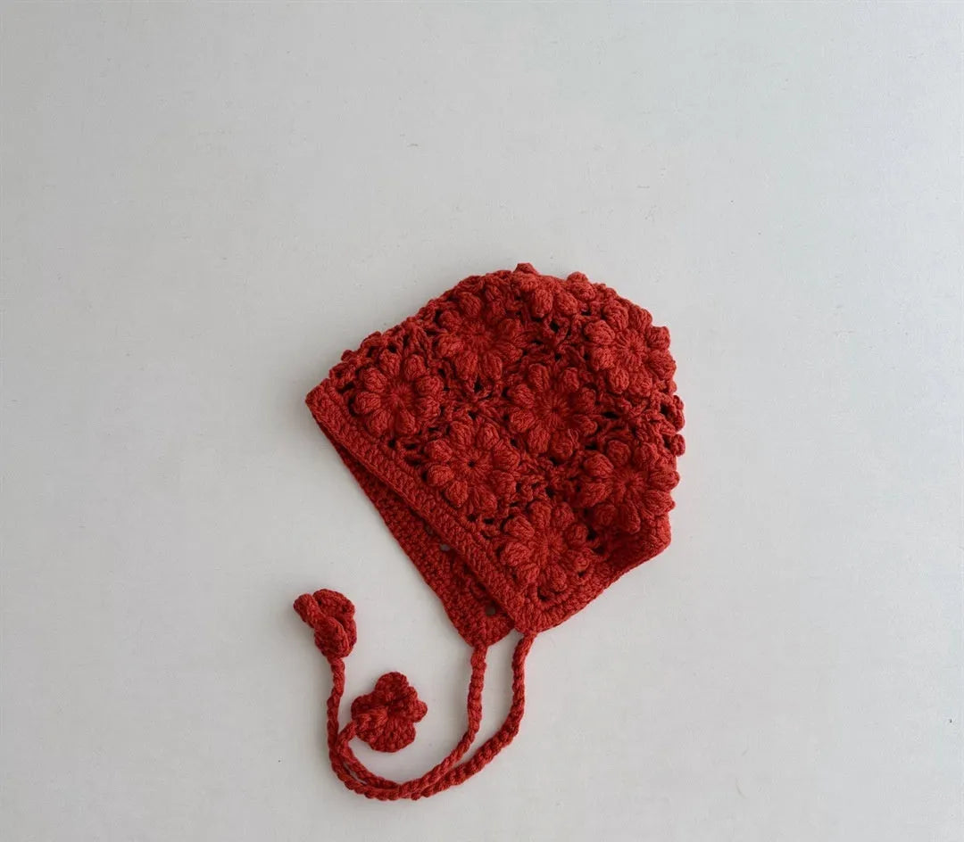 Breathable lace-up earflap winter hat for girls in beige with dome crown and jacquard weave