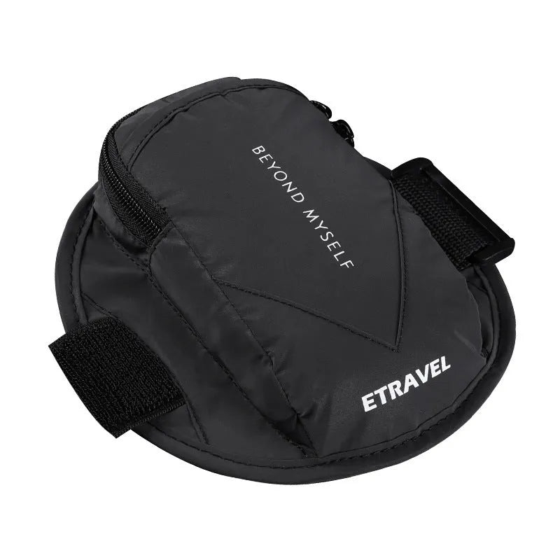 Black reflective running arm bag with adjustable strap, shown on an arm.