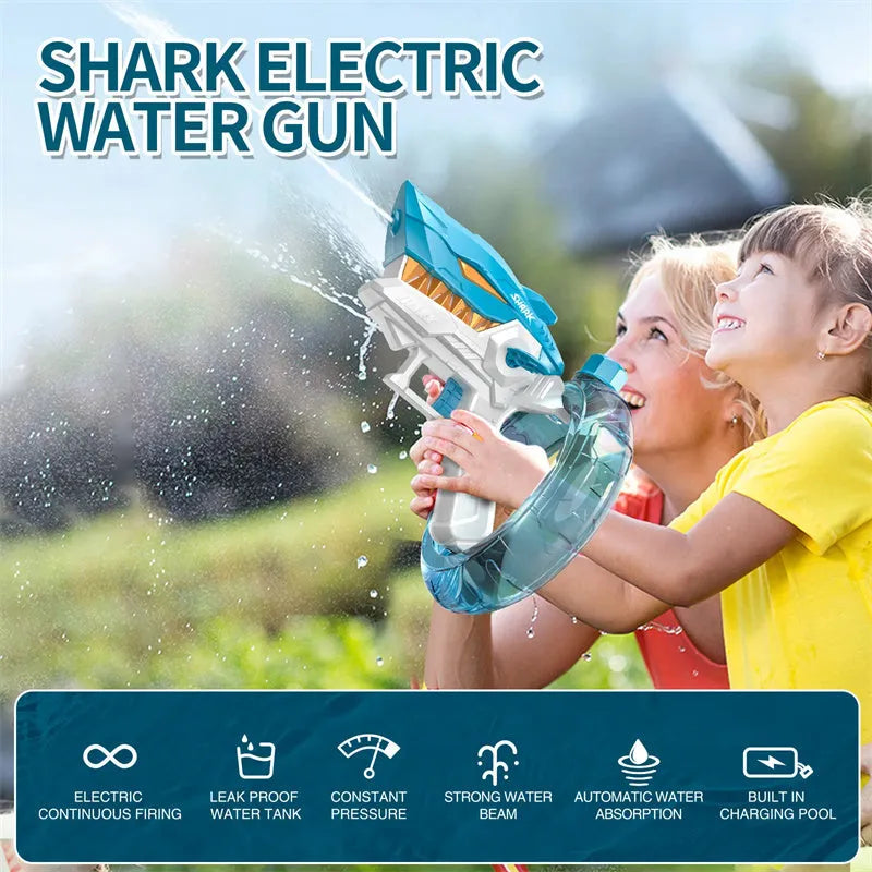 Blue Shark-shaped electric water gun toy with large tank on a summer beach.