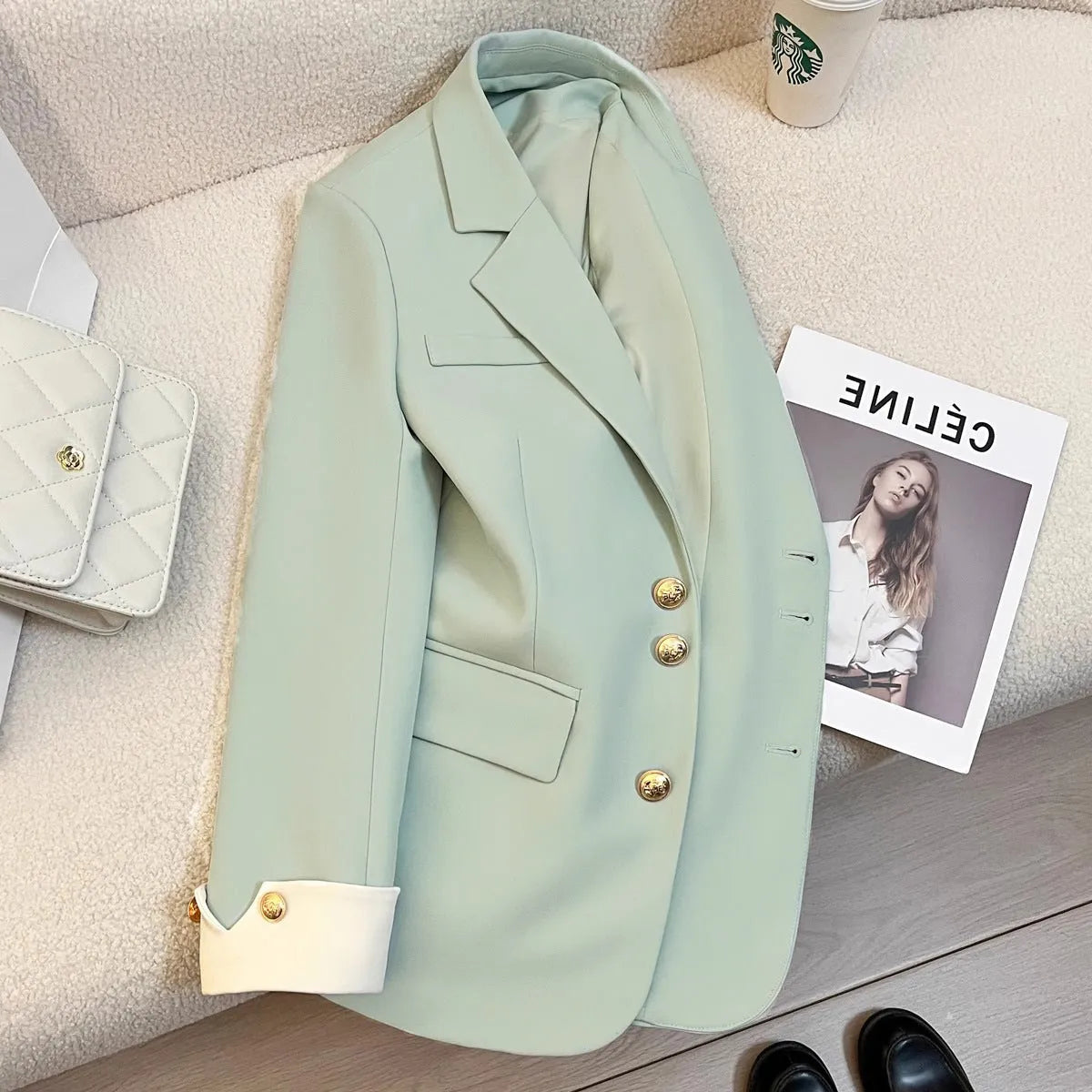 Korean-style women's coat in milky white with loose fit and pockets