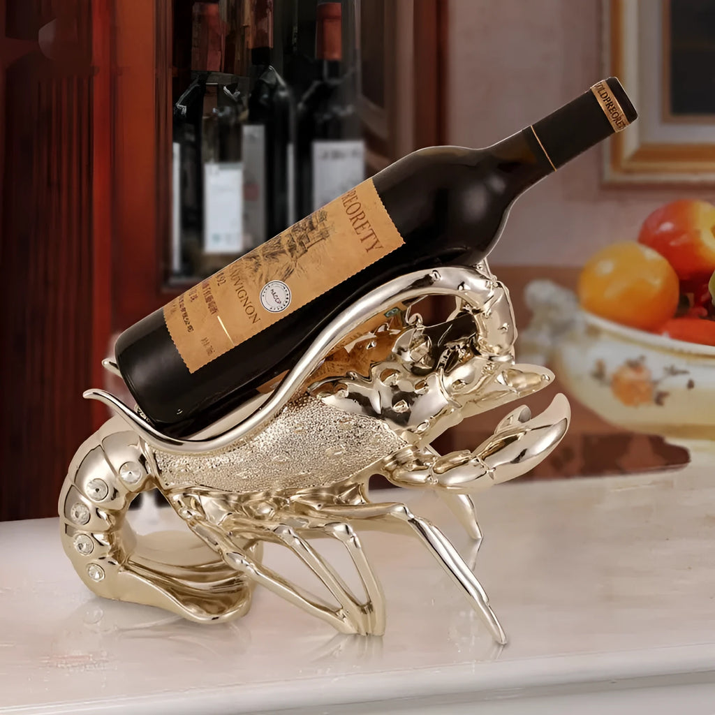 Lobster-shaped decorative wine rack ornament in rose gold or silver holding wine bottle