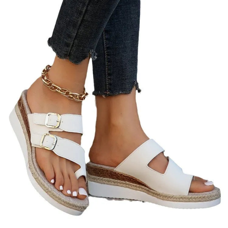 White patent leather wedge sandals with woven upper and peep toe design