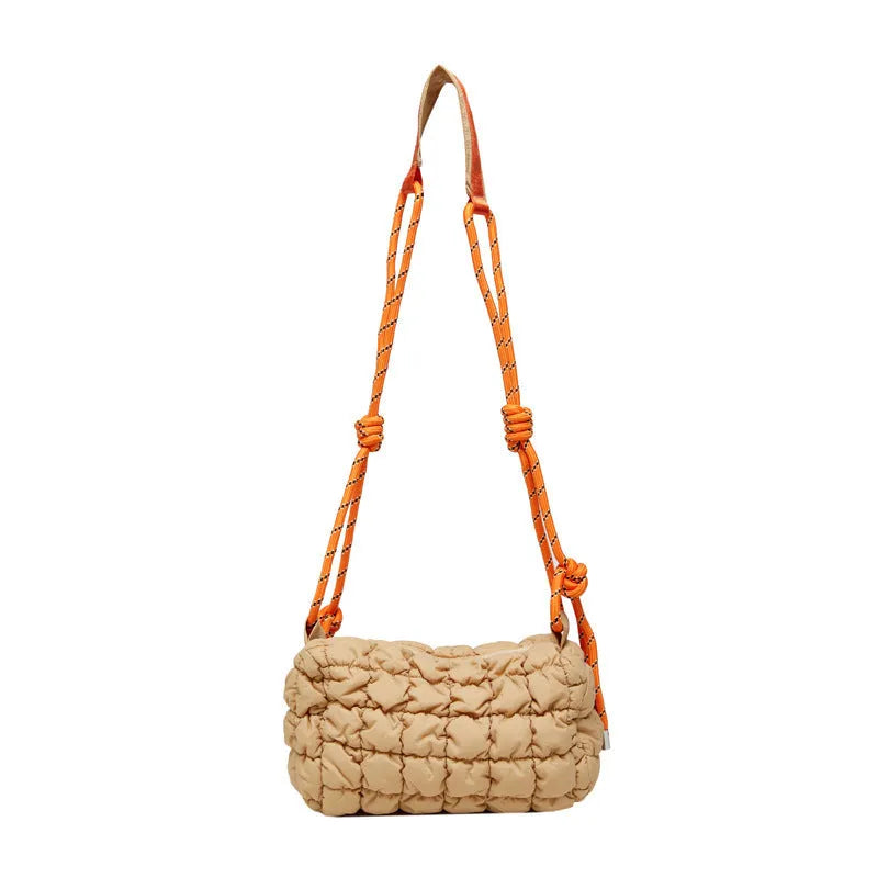 Women's lightweight nylon messenger bag in pillow shape with diamond quilted pattern