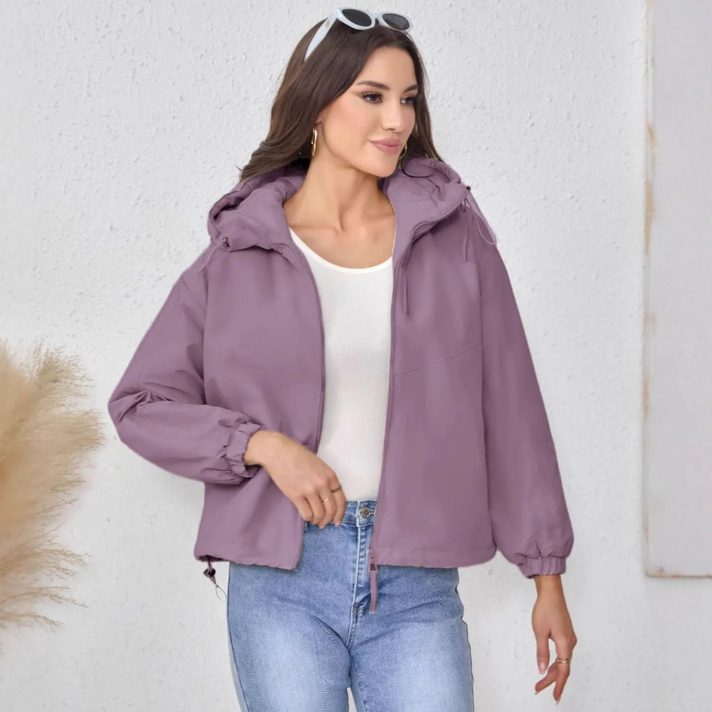 Women's grey hooded loose-fit polyester shell jacket with long sleeves