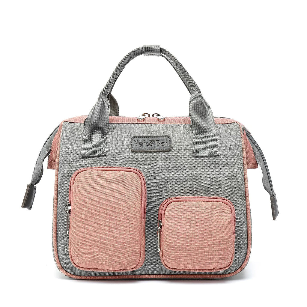 A grey oxford cloth handbag showing its large main compartment and external three-dimensional pocket.