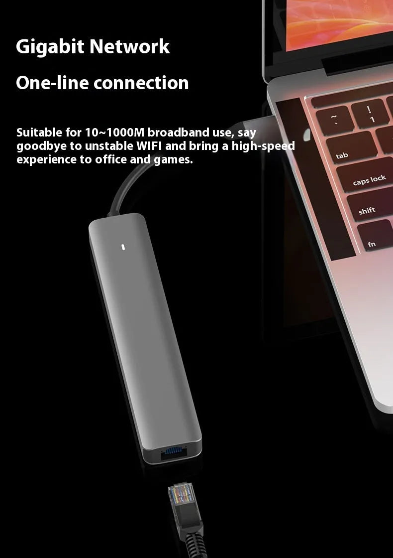 Silver aluminium 7-in-1 USB hub with SD card slot, microSD slot, USB-C PD port, and multiple USB-A ports.