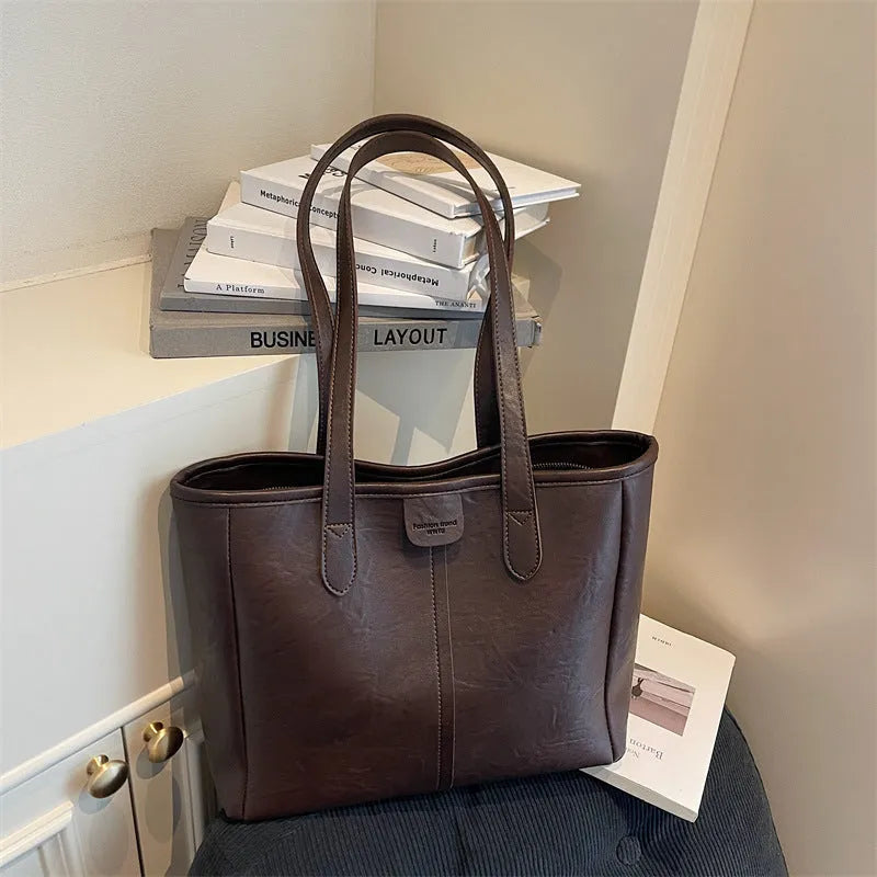 Women's large capacity PU shoulder bag in black with double straps and open top showing 37cm width and 29cm height