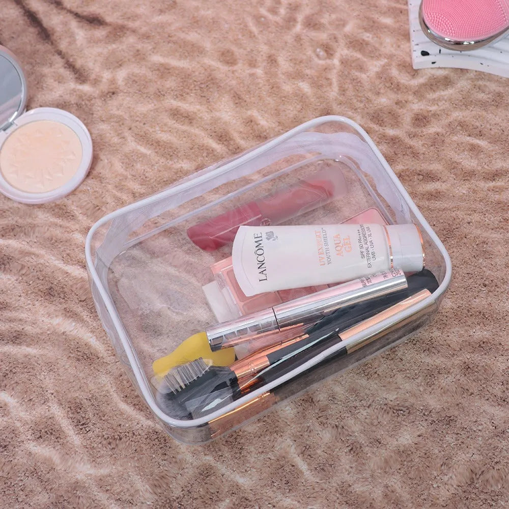 Transparent PVC makeup bag in black, pink or white colours with customisable logo option
