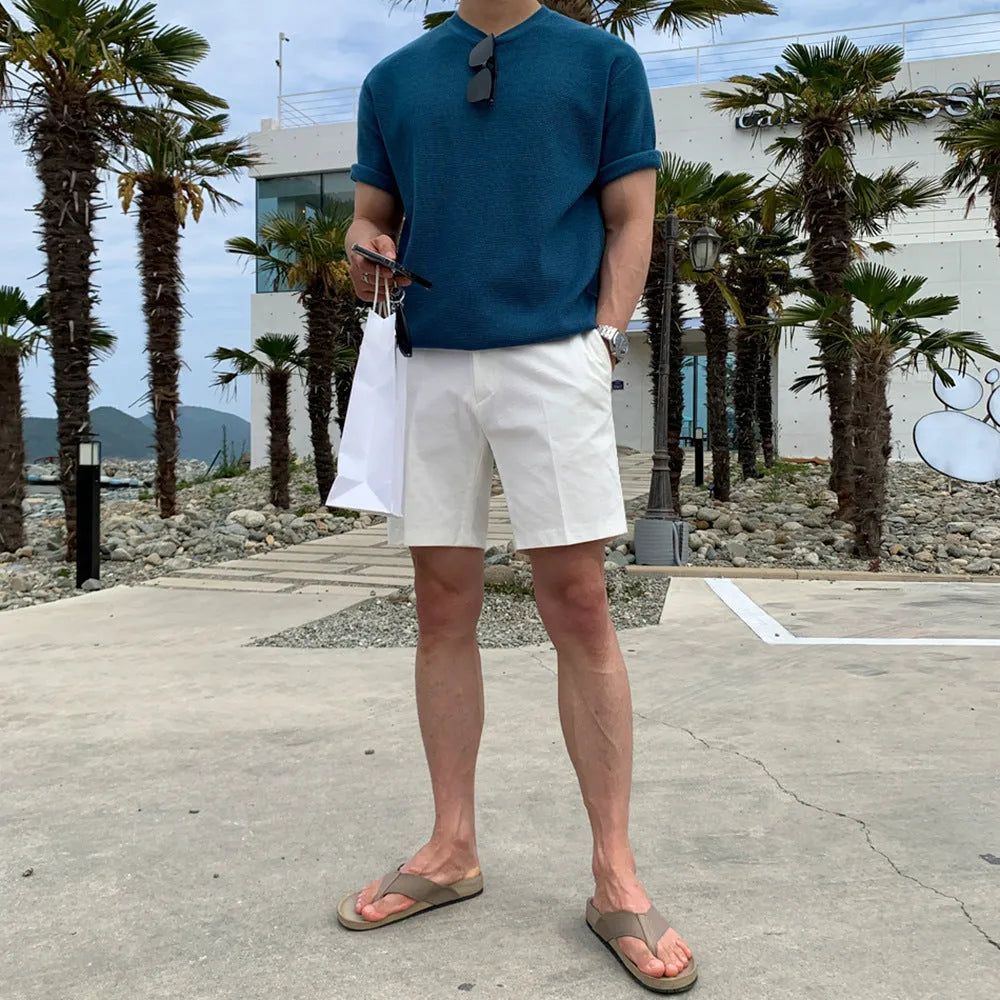 Men's straight leg casual shorts in non-ironing polyester fabric available in black, white, and khaki colours