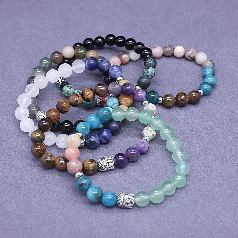 Natural stone agate mixed colour elastic bracelet unisex with black agate and tigereye beads on white background