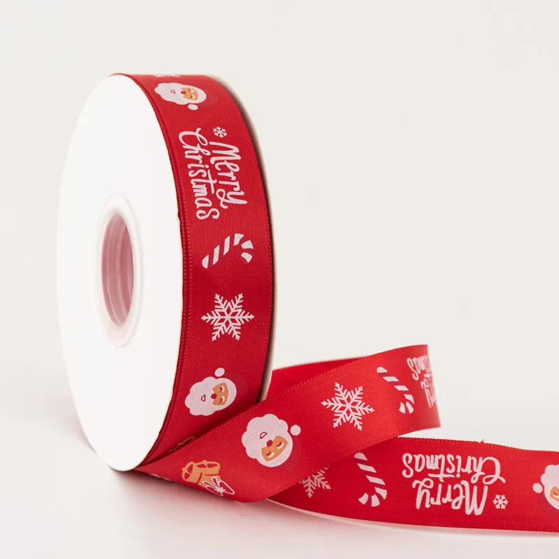 2.5cm Christmas polyester ribbon roll 22m in Ink Green or Red with Elk, bell, Santa, Sled, or Snowman design